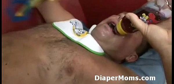  Horny mommy takes off chunky adult babys diaper off then strap-on fucks him